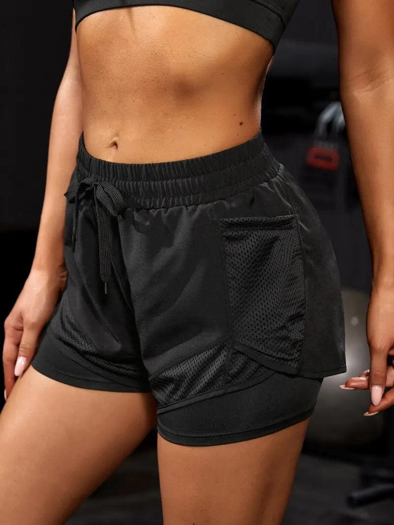 Shorts esportivos elásticos femininos, shorts com bolsos, leggings de ioga de duas peças falsas para corrida e treinamento